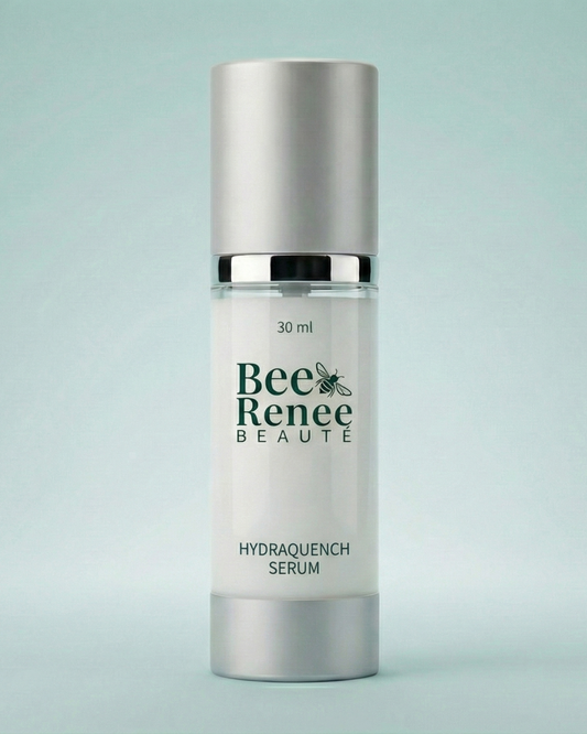 Bottle of Bee Renee Beaute serum on a light gray background